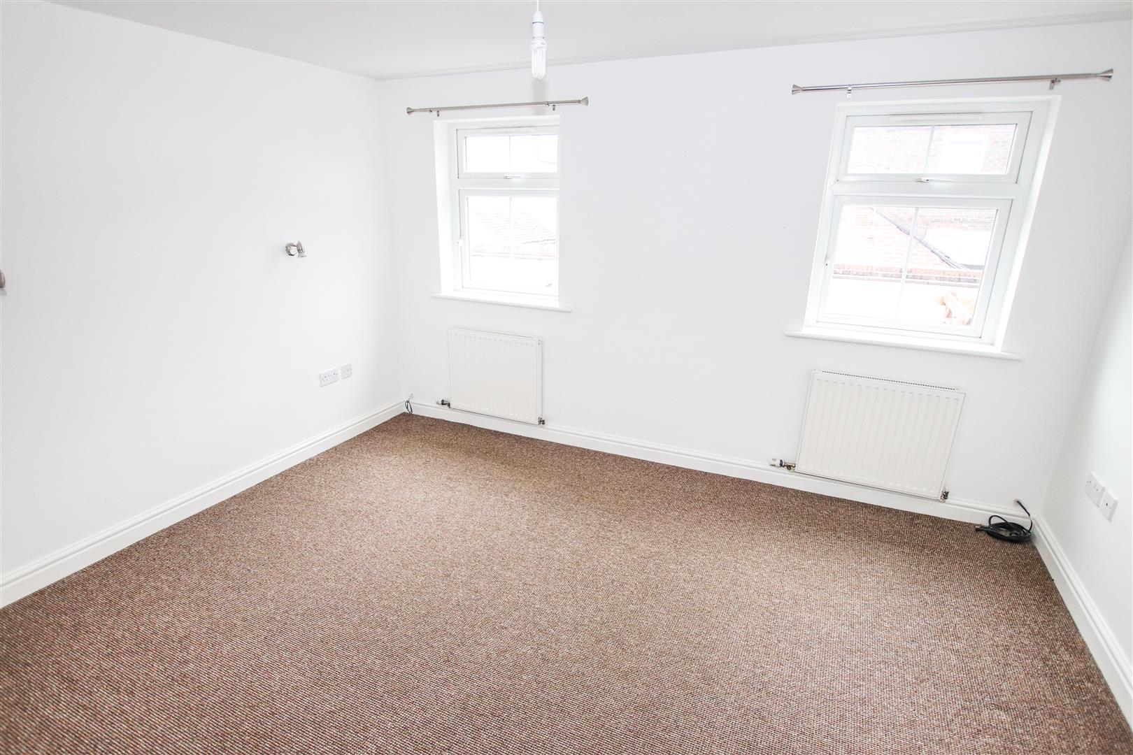 BEDROOM ONE (REAR)